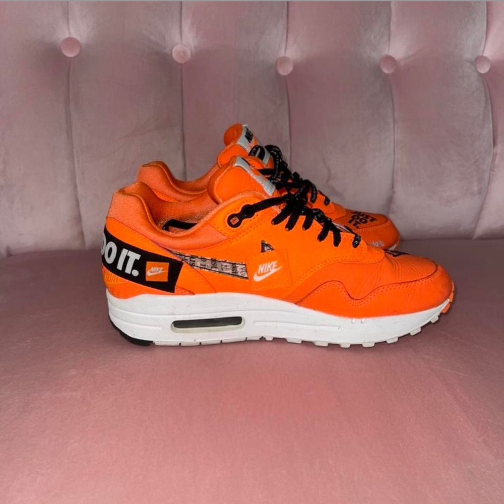 Orange and black patchwork Nike Airmaxs. Slightly used.